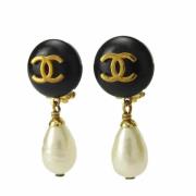 Pre-owned Metal earrings Chanel Vintage , Yellow , Dames