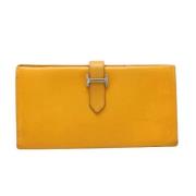 Pre-owned Leather wallets Hermès Vintage , Orange , Dames