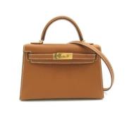 Pre-owned Leather shoulder-bags Hermès Vintage , Brown , Dames