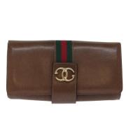 Pre-owned Leather clutches Gucci Vintage , Brown , Dames