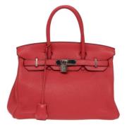 Pre-owned Leather handbags Hermès Vintage , Red , Dames