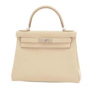 Pre-owned Leather handbags Hermès Vintage , Beige , Dames