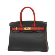 Pre-owned Leather handbags Hermès Vintage , Black , Dames