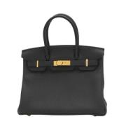 Pre-owned Leather handbags Hermès Vintage , Black , Dames