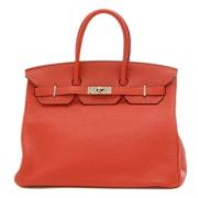 Pre-owned Leather handbags Hermès Vintage , Red , Dames