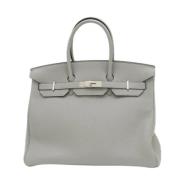 Pre-owned Leather handbags Hermès Vintage , Gray , Dames