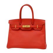 Pre-owned Leather handbags Hermès Vintage , Red , Dames