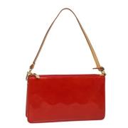 Pre-owned Leather pouches Louis Vuitton Vintage , Red , Dames