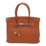 Pre-owned Leather handbags Hermès Vintage , Brown , Dames