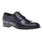 Lace-ups in black leather Baldinini , Black , Heren