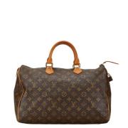 Pre-owned Canvas handbags Louis Vuitton Vintage , Brown , Dames