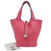 Pre-owned Leather handbags Hermès Vintage , Pink , Dames