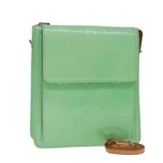 Pre-owned Leather pouches Louis Vuitton Vintage , Green , Dames