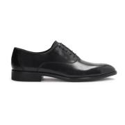 Zwarte oxfords voor mannen met versierde tenen Kazar , Black , Heren