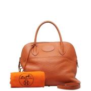 Pre-owned Leather handbags Hermès Vintage , Orange , Dames