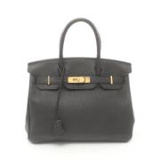 Pre-owned Leather handbags Hermès Vintage , Black , Dames