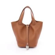 Pre-owned Leather handbags Hermès Vintage , Brown , Dames