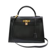 Pre-owned Leather handbags Hermès Vintage , Black , Dames