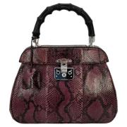 Pre-owned Suede handbags Gucci Vintage , Purple , Dames