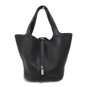 Pre-owned Leather handbags Hermès Vintage , Black , Dames