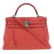 Pre-owned Leather handbags Hermès Vintage , Pink , Dames