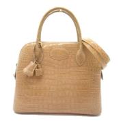 Pre-owned Leather handbags Hermès Vintage , Beige , Dames