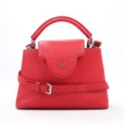 Pre-owned Leather handbags Louis Vuitton Vintage , Red , Dames