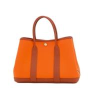 Pre-owned Leather handbags Hermès Vintage , Orange , Dames