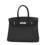 Pre-owned Leather handbags Hermès Vintage , Black , Unisex