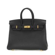 Pre-owned Leather handbags Hermès Vintage , Black , Dames