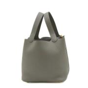 Pre-owned Leather handbags Hermès Vintage , Gray , Dames