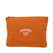 Pre-owned Fabric clutches Hermès Vintage , Orange , Heren