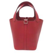 Pre-owned Leather handbags Hermès Vintage , Red , Dames