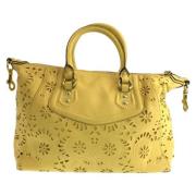 Pre-owned Leather handbags Coach Pre-owned , Yellow , Dames