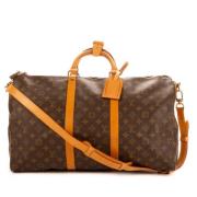 Pre-owned Coated canvas handbags Louis Vuitton Vintage , Brown , Dames