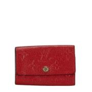 Pre-owned Leather key-holders Louis Vuitton Vintage , Red , Dames