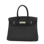 Pre-owned Leather handbags Hermès Vintage , Black , Dames