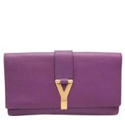 Pre-owned Leather clutches Yves Saint Laurent Vintage , Purple , Dames