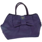 Pre-owned Nylon handbags Prada Vintage , Purple , Dames