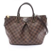 Pre-owned Canvas handbags Louis Vuitton Vintage , Brown , Dames