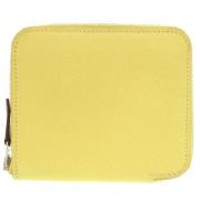 Pre-owned Leather wallets Hermès Vintage , Yellow , Dames