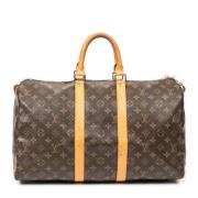 Pre-owned Coated canvas handbags Louis Vuitton Vintage , Brown , Dames