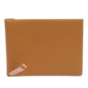 Pre-owned Leather clutches Hermès Vintage , Brown , Dames