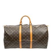 Pre-owned Canvas travel-bags Louis Vuitton Vintage , Brown , Dames