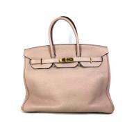 Pre-owned Leather handbags Hermès Vintage , Pink , Dames