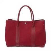 Pre-owned Canvas handbags Hermès Vintage , Red , Dames