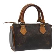 Pre-owned Canvas handbags Louis Vuitton Vintage , Brown , Dames