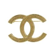 Pre-owned Metal brooches Chanel Vintage , Yellow , Dames