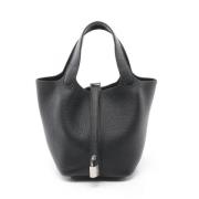 Pre-owned Leather handbags Hermès Vintage , Black , Dames