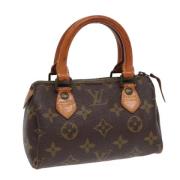 Pre-owned Canvas handbags Louis Vuitton Vintage , Brown , Dames